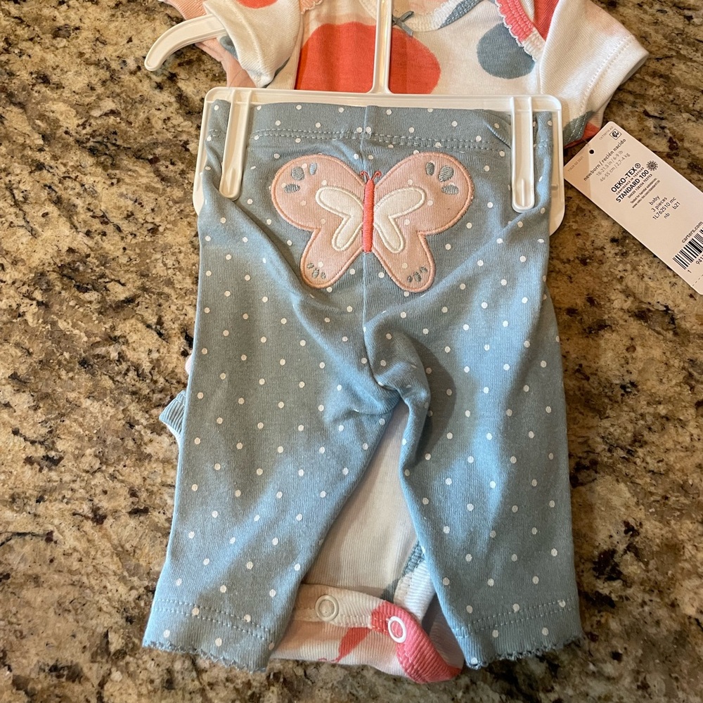 NWT Carters 3 piece newborn outfit.